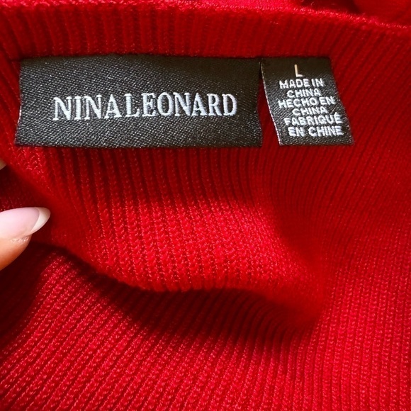 Red knit sweater dress size large. Knee length with bubble sleeves. - Picture 3 of 3